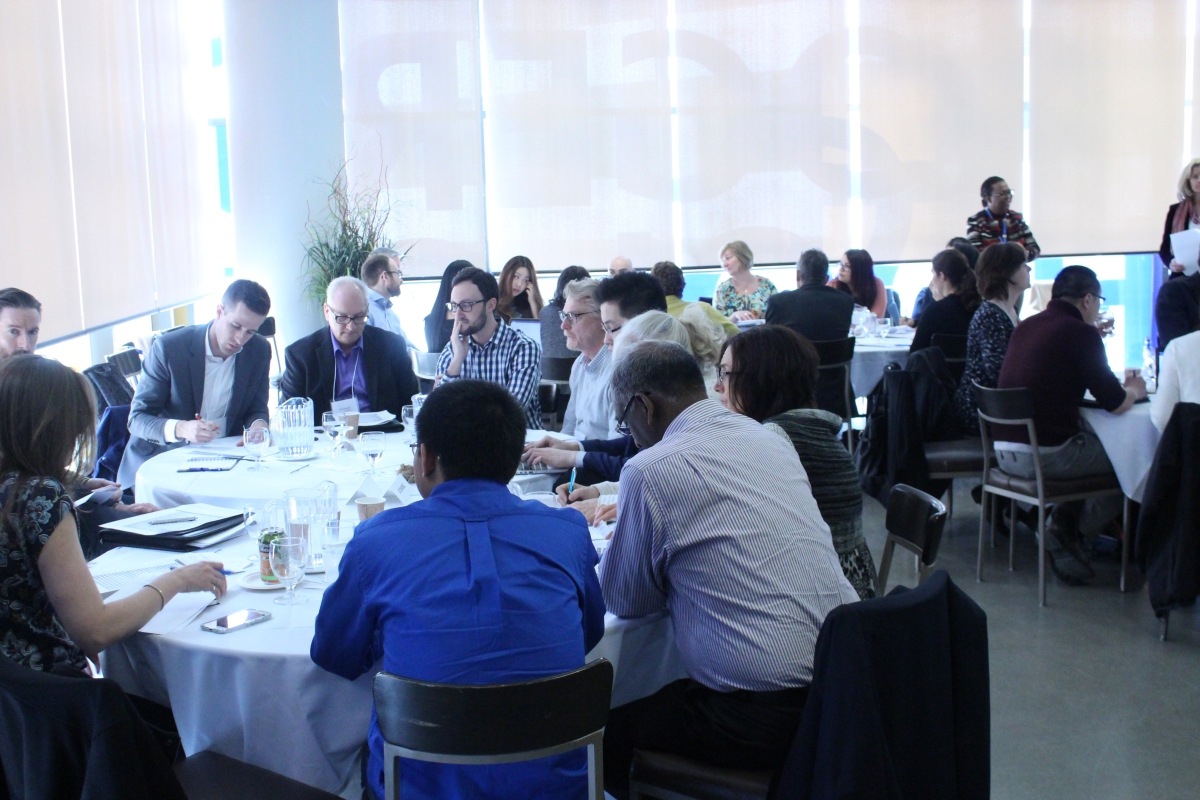 people networking at round tables