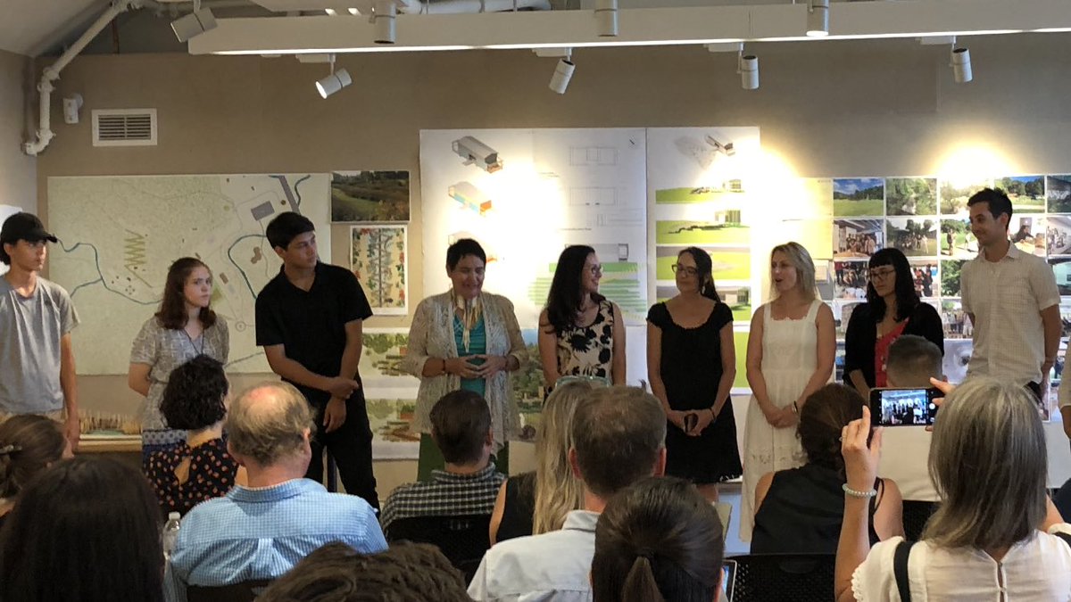 group of children listening to presentation