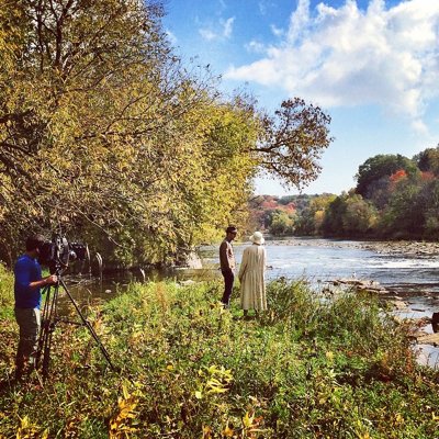 people looking into a body of water