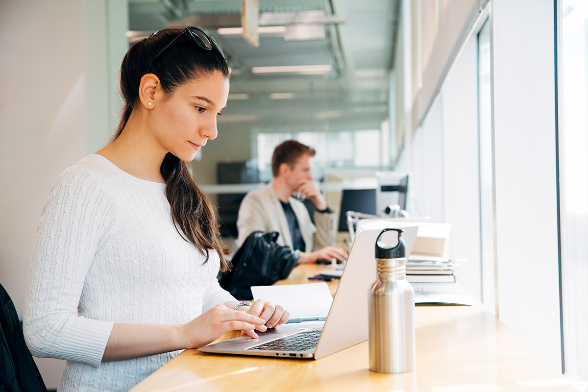 Female student working on a laptop