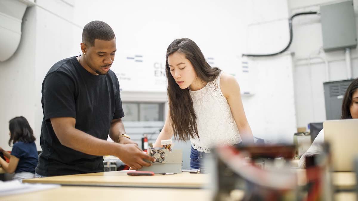 Two students working on a project