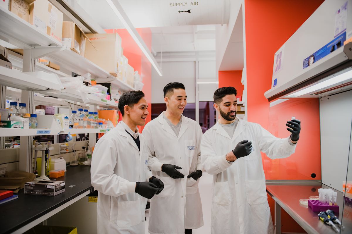 3 members of the Biofect Innovations team observe product in the lab