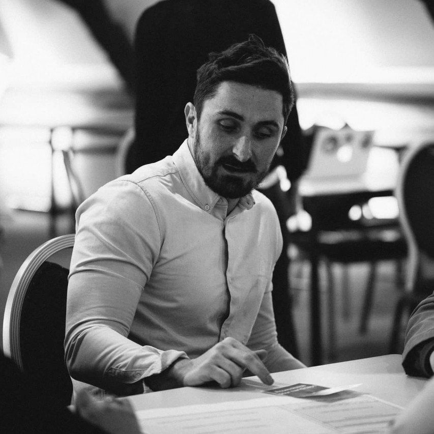 Louis Etienne Dubois sitting at a table
