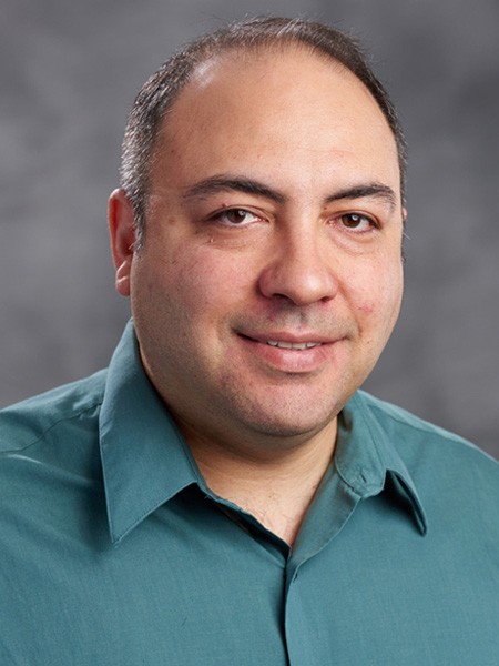 Headshot of Dr. Ozgur Turetken 