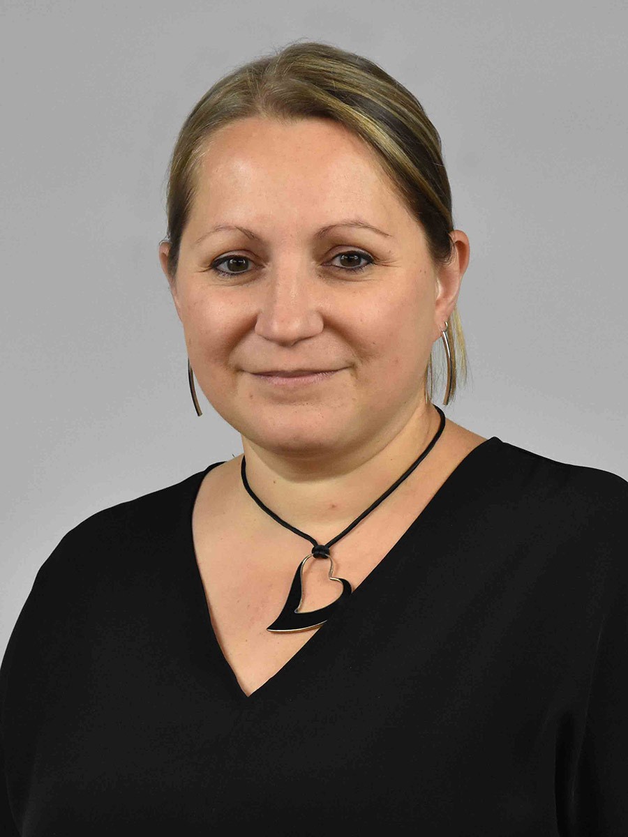 Headshot of Dr. Vess Stamenova, Assistant Professor 