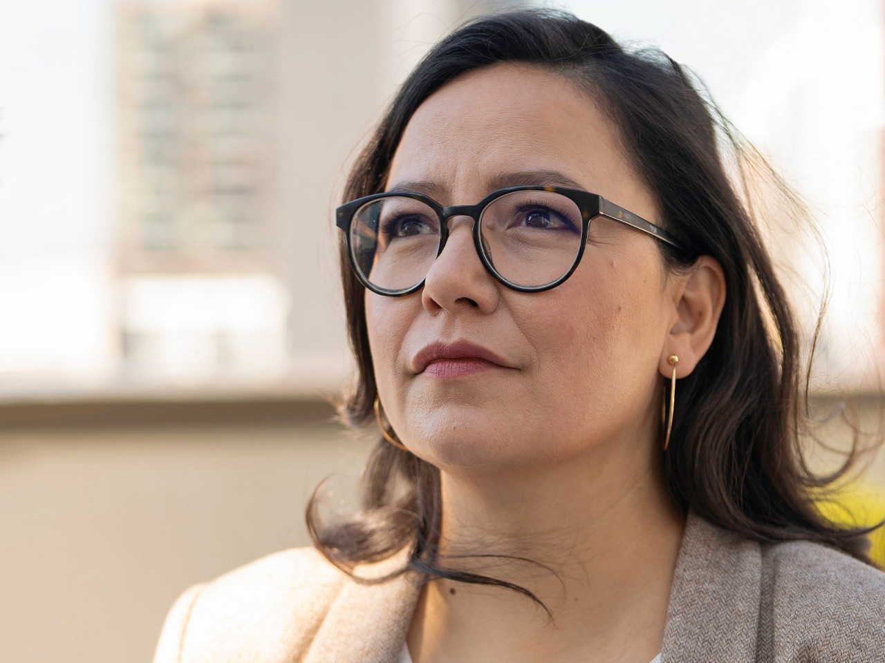 Headshot of Connie Walker looking off into the distance.