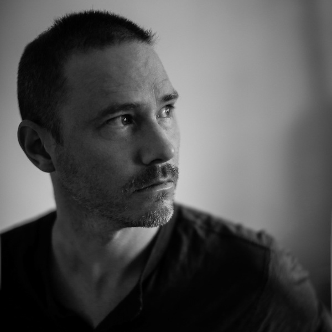 Black and white headshot of Liam Maloney