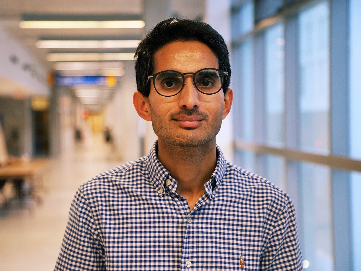 Dr. Vaseem Shaik's headshot inside a TMU's building